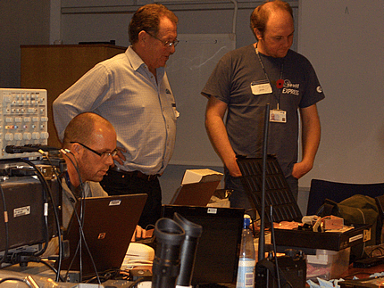 Graham and Jason watch as Duncan (sitting) uploads a command to FUNcube Graham and Jason watch as Duncan (sitting) uploads a command to FUNcube